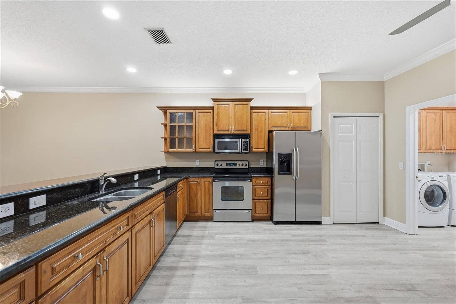 9718 TAYLOR ROSE LANE, Seminole, FL 33777 Large kitchen with plenty of storage