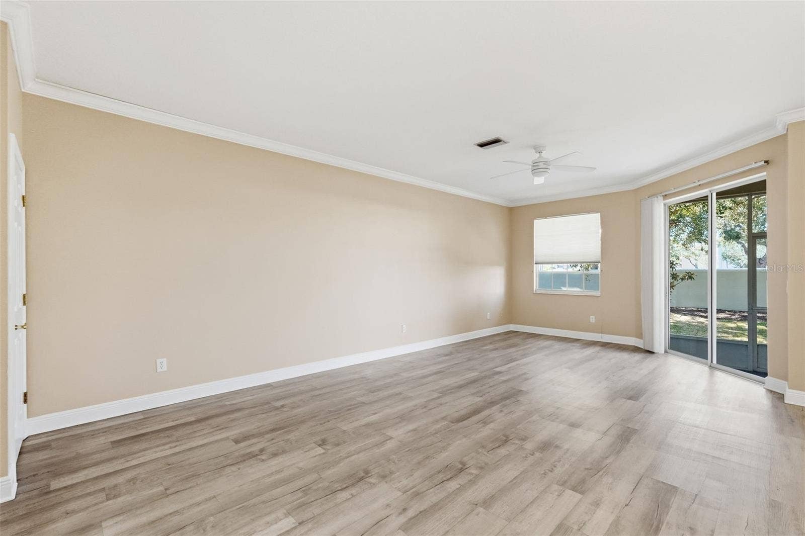 9718 TAYLOR ROSE LANE, Seminole, FL 33777 Open living room with a lot of light