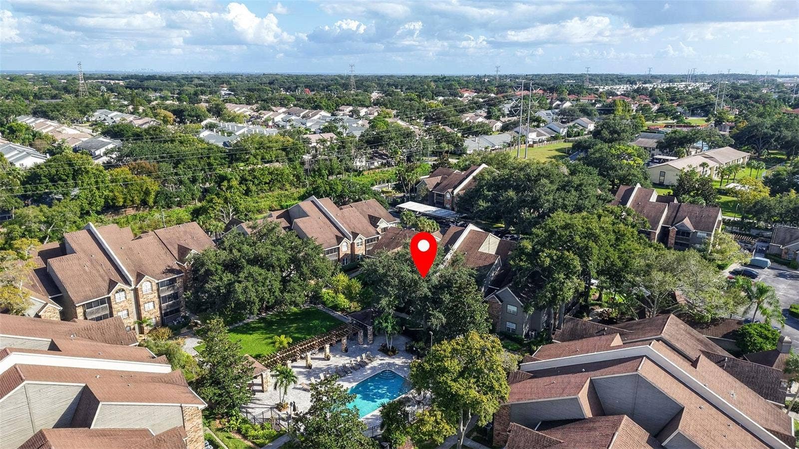 2500 WINDING CREEK BOULEVARD, #I106, Clearwater, FL 33761 View of unit and pool