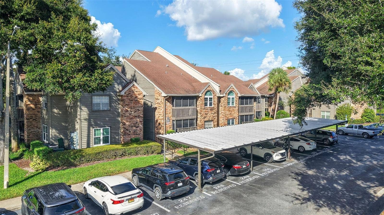 2500 WINDING CREEK BOULEVARD, #I106, Clearwater, FL 33761 Front of building with car port space included