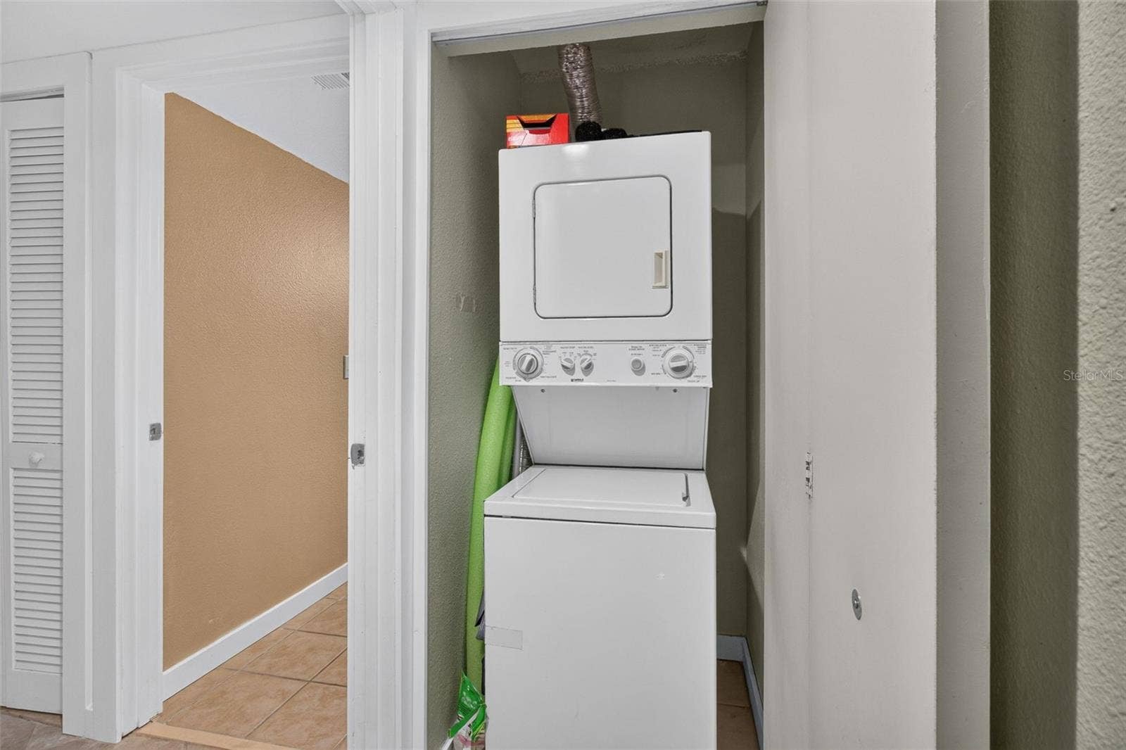 2500 WINDING CREEK BOULEVARD, #I106, Clearwater, FL 33761 Laundry closet near 2nd bath.