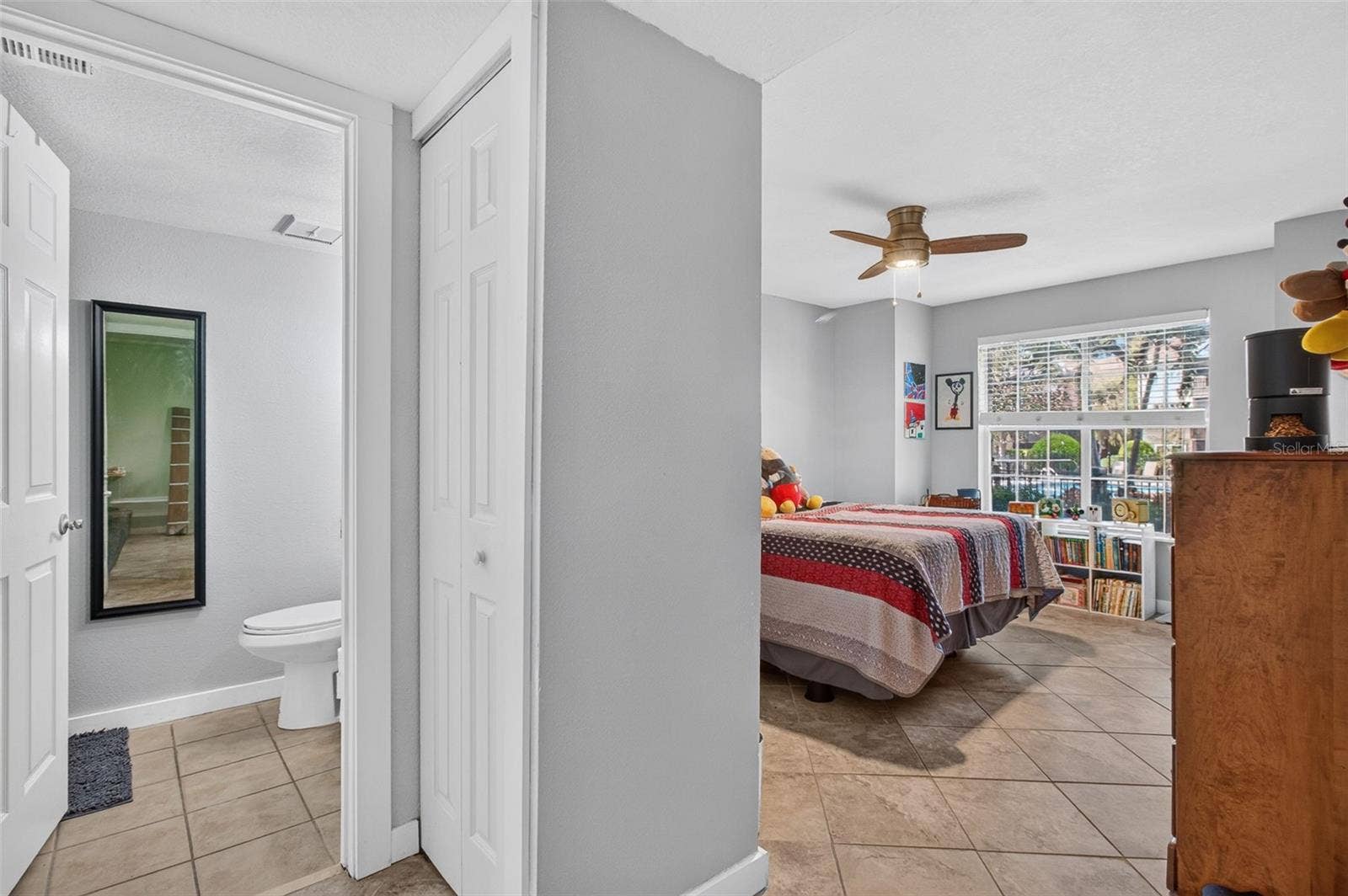2500 WINDING CREEK BOULEVARD, #I106, Clearwater, FL 33761 View of primary suite from living room