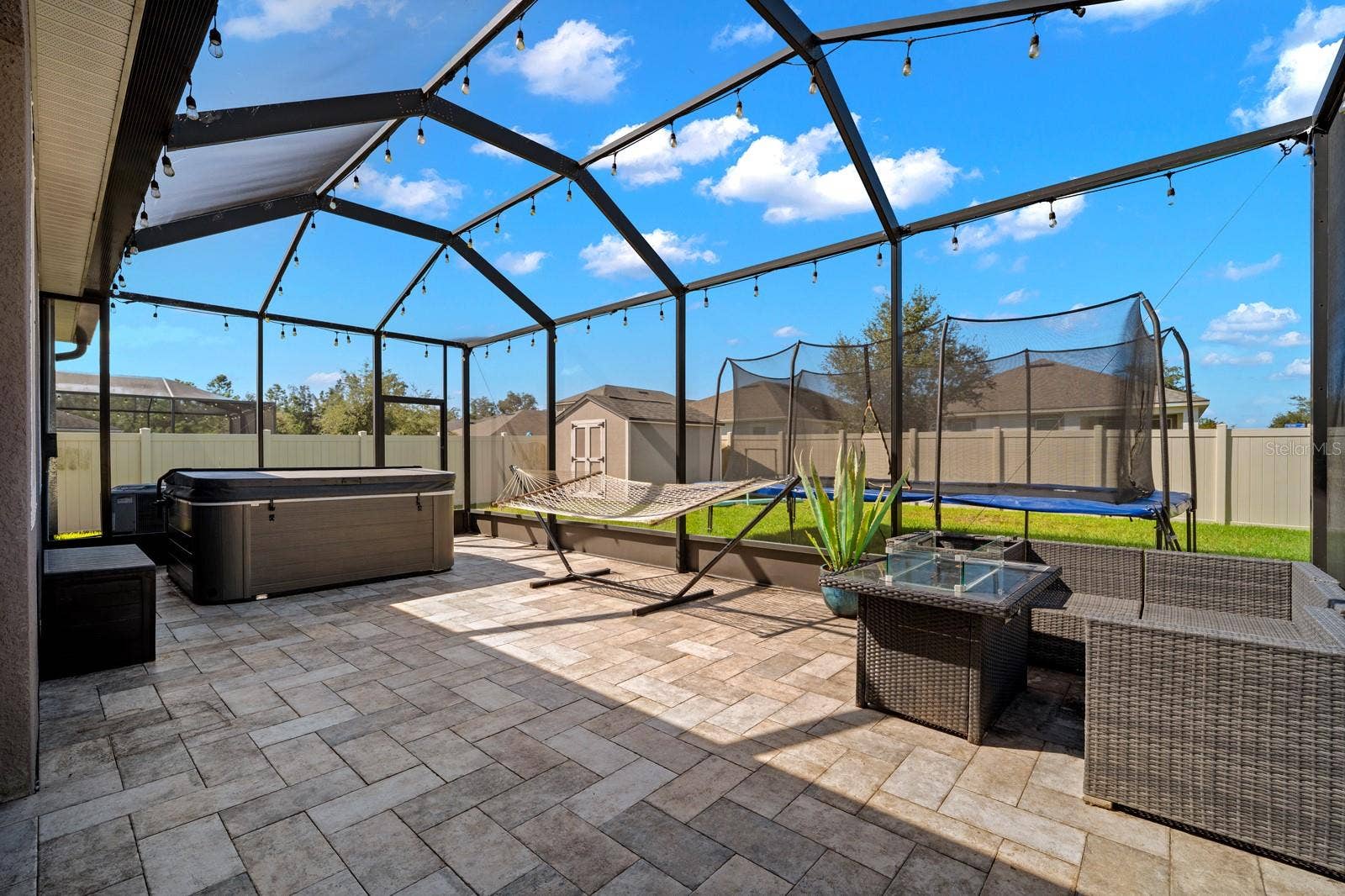 10654 PLANER PICKET DRIVE, Riverview, FL 33569 Large screened lanai with pavers, hot tub and room for lounging