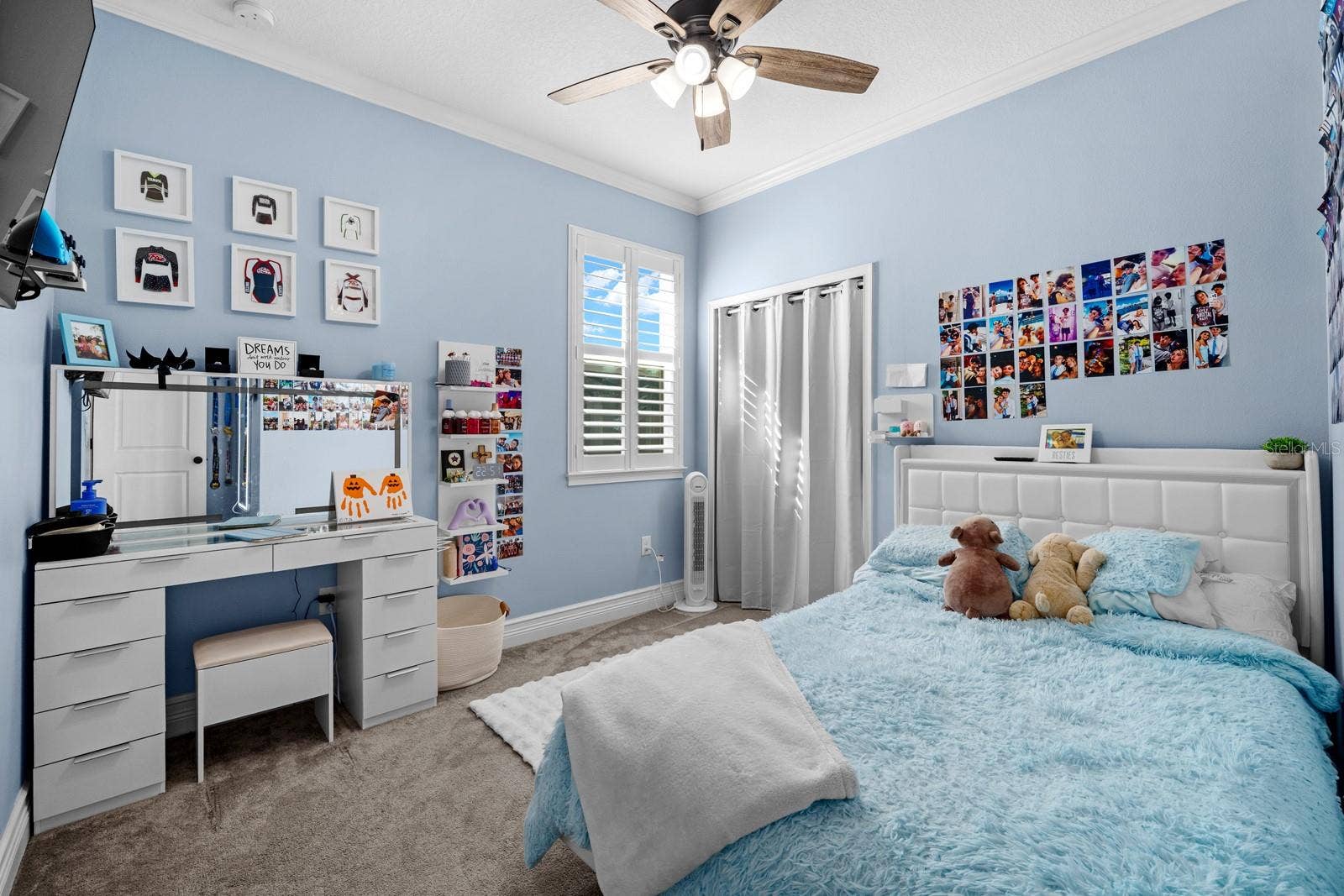 10654 PLANER PICKET DRIVE, Riverview, FL 33569 Bedroom with ceiling fan, plantation shutters and double-door closet