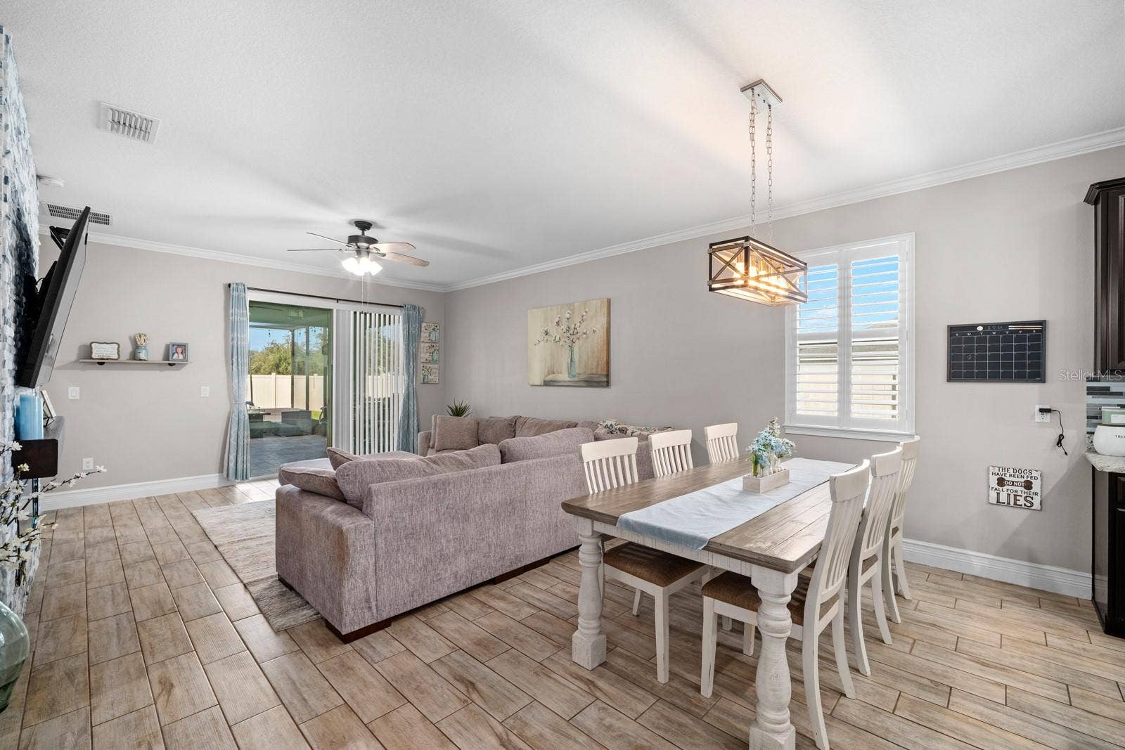 10654 PLANER PICKET DRIVE, Riverview, FL 33569 Dining area open to the family room, with wood-look tile throughout