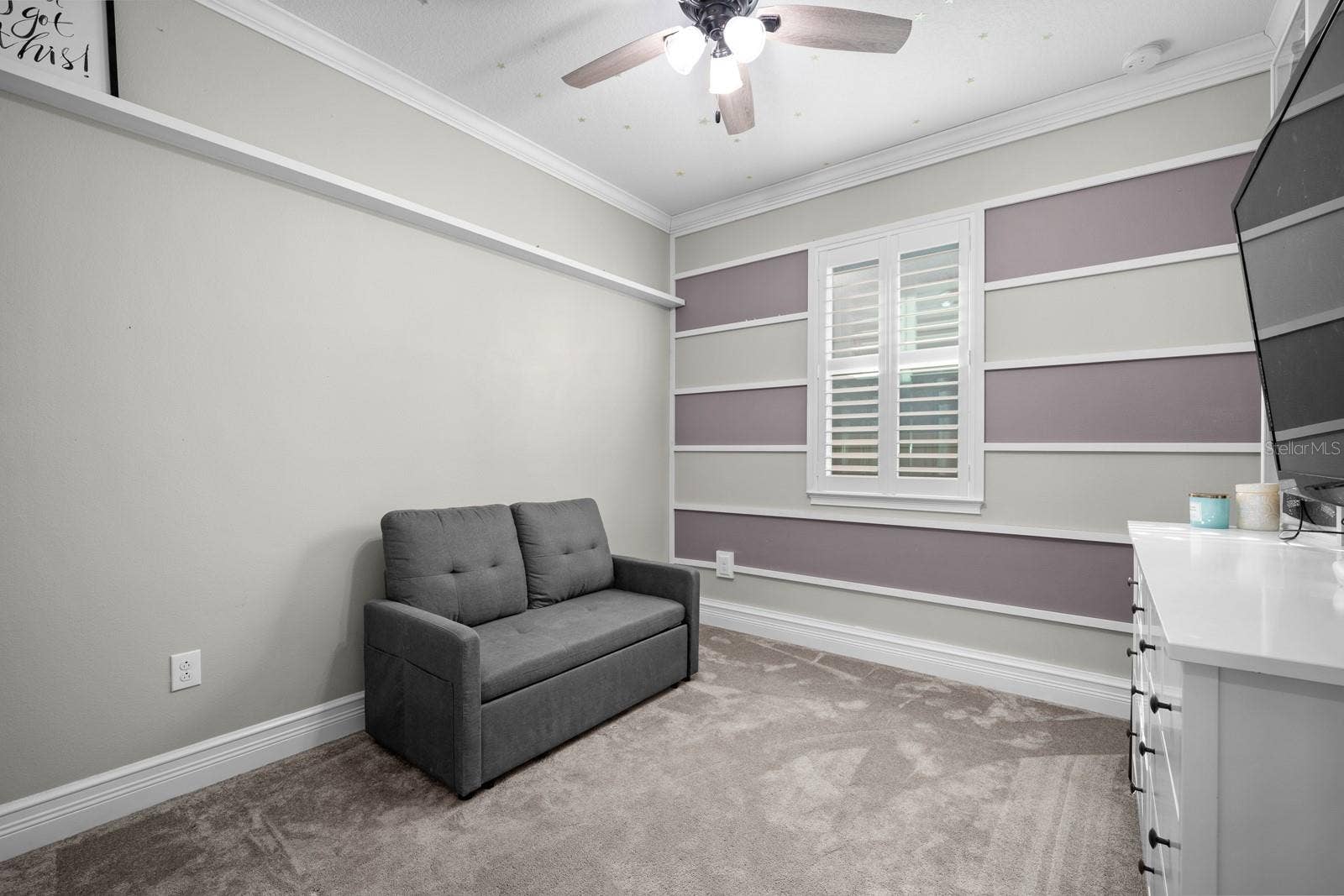 10654 PLANER PICKET DRIVE, Riverview, FL 33569 Bedroom with accent wall, ceiling fan and plantation shutters