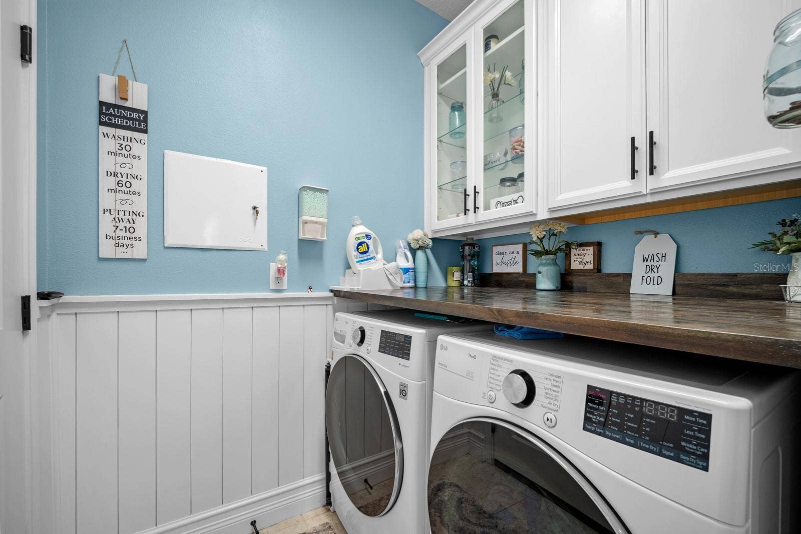 10654 PLANER PICKET DRIVE, Riverview, FL 33569 Laundry room with upper cabinets, butcher block counter and folding space-Washer Dryer do not convey.