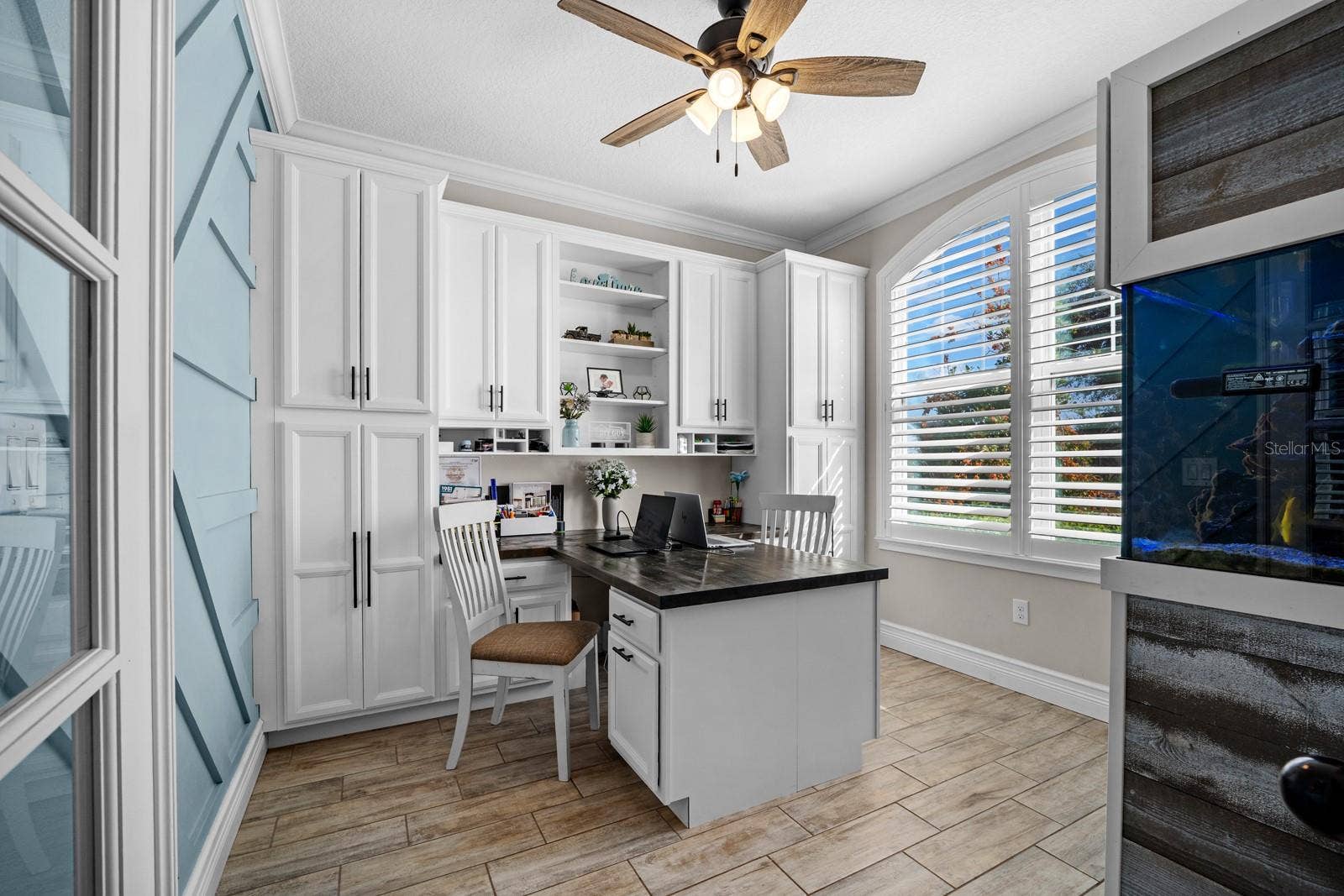 10654 PLANER PICKET DRIVE, Riverview, FL 33569 Office off the foyer with built-in cabinets, desk and plantation shutters