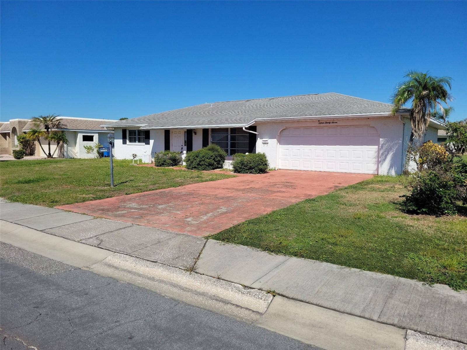 1527 ALLEGHENY DRIVE, Sun City Center, FL 33573 view looking NE at house
