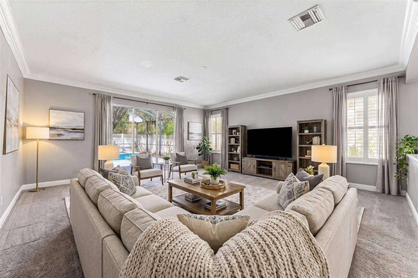 4319 RUSTIC PINE PLACE, Wesley Chapel, FL 33544 Family Room Virtually Staged