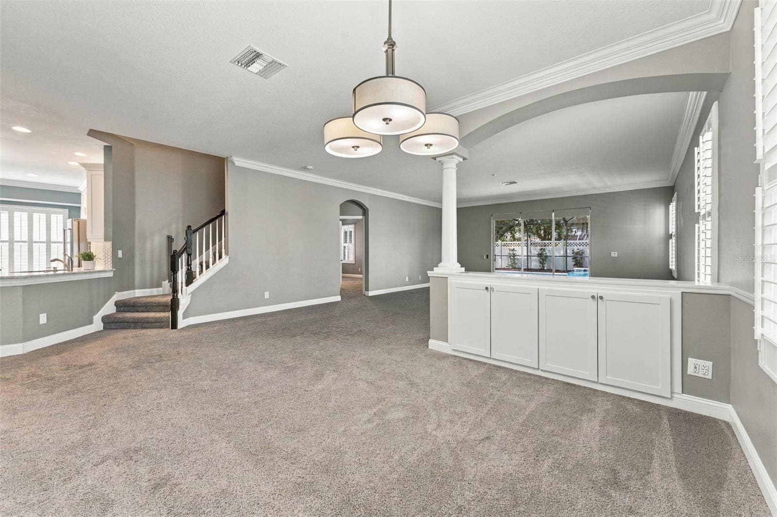 4319 RUSTIC PINE PLACE, Wesley Chapel, FL 33544 Dining Room with stairs to bonus