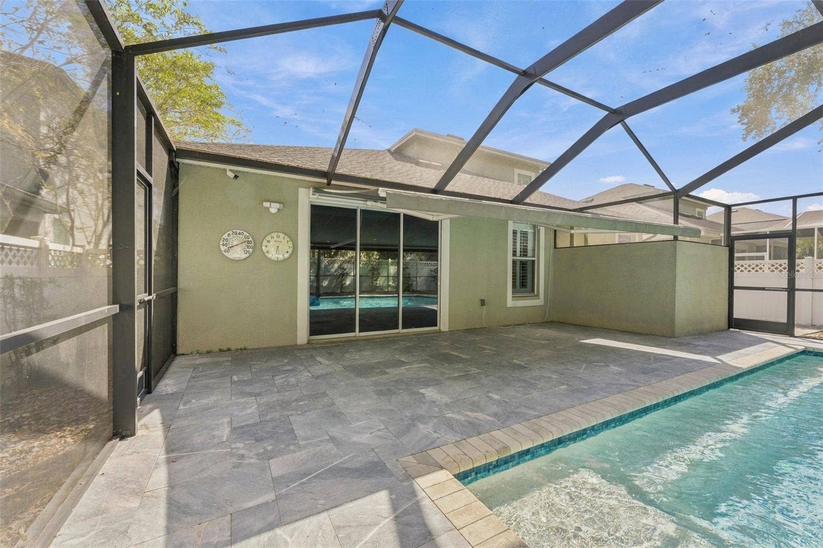4319 RUSTIC PINE PLACE, Wesley Chapel, FL 33544 Maintenance Free Marble Patio