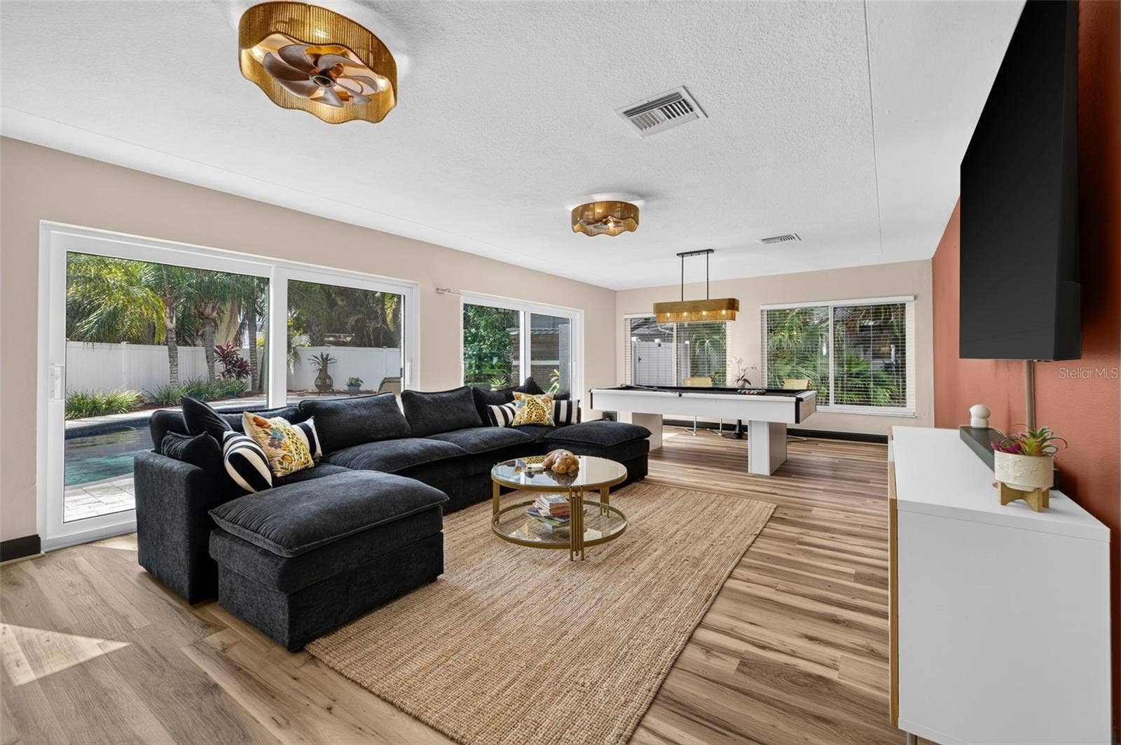 Family room with sliders to pool