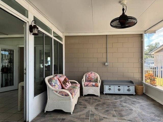 5717 15TH AVENUE N, St Petersburg, FL 33710 Screened porch view from back yard entry