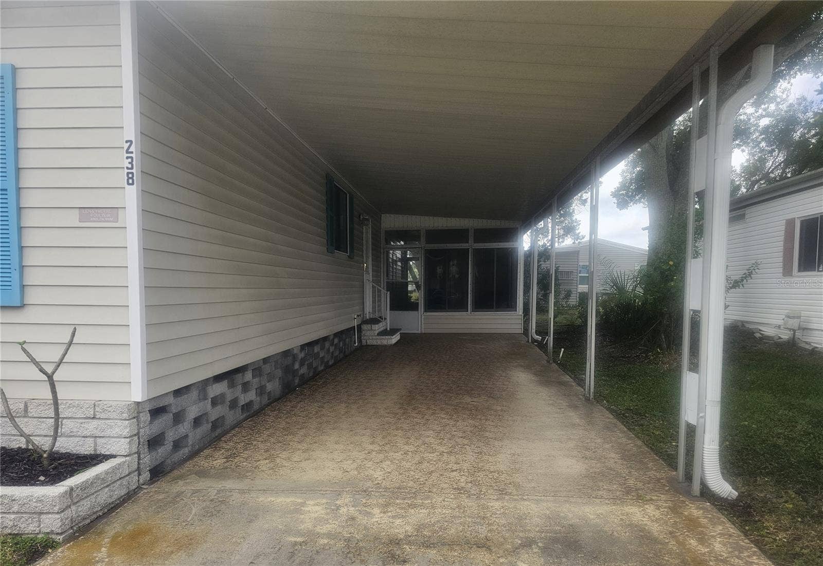 238 PELICAN DRIVE N, Oldsmar, FL 34677 Carport/Enclosed Lanai