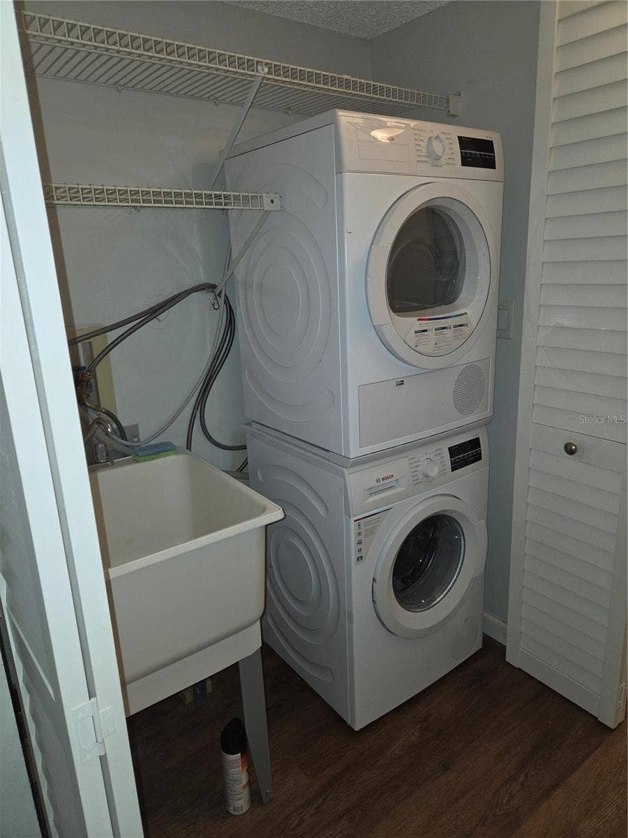 5943 CALAIS BOULEVARD N, #6, St Petersburg, FL 33714 Inside laundry closet with utility sink