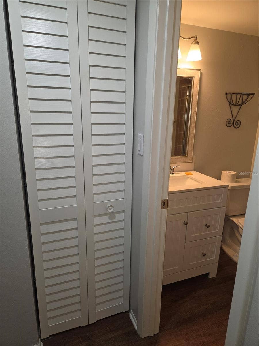 5943 CALAIS BOULEVARD N, #6, St Petersburg, FL 33714 Linen closet outside guest bathroom