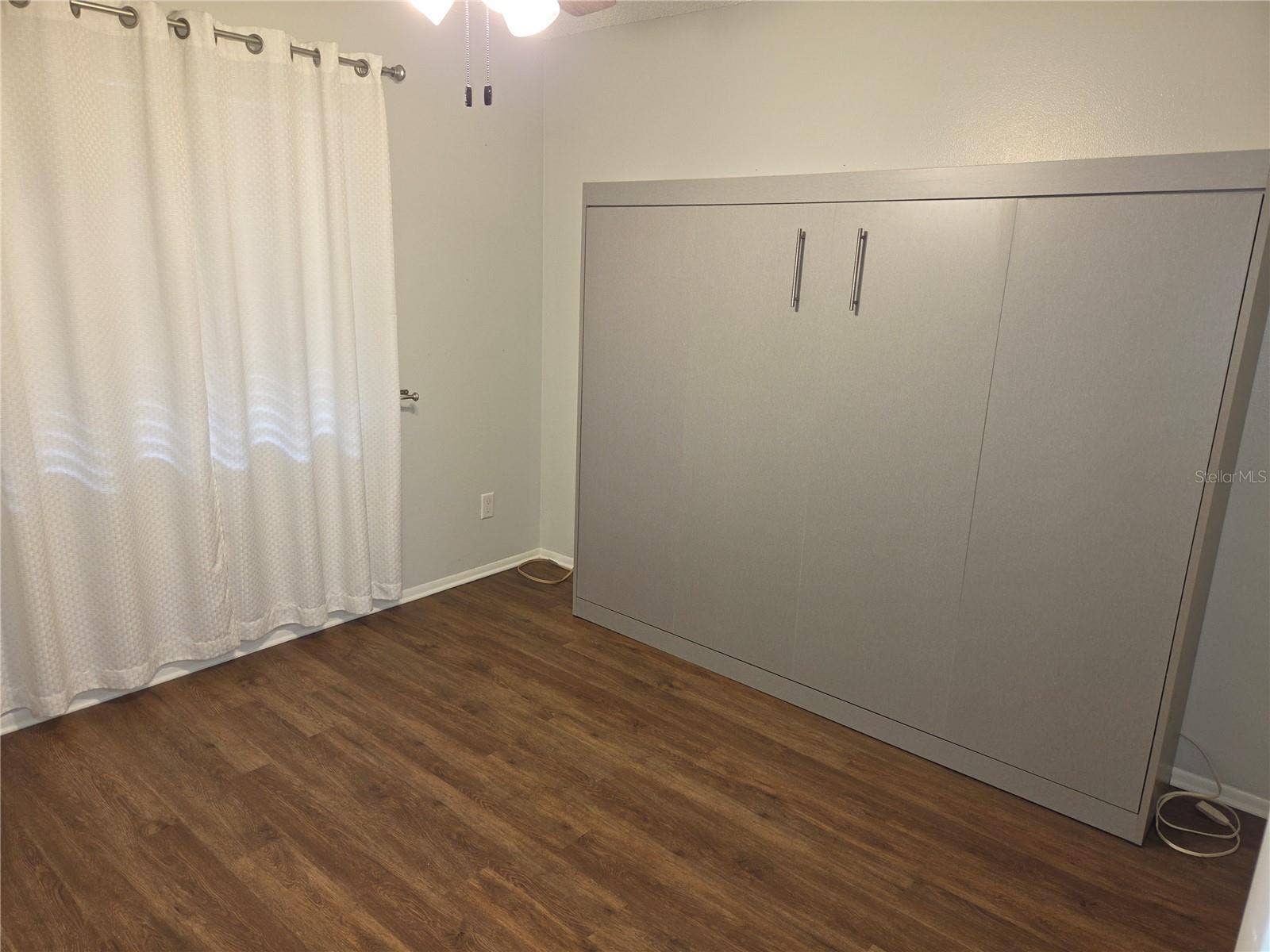 5943 CALAIS BOULEVARD N, #6, St Petersburg, FL 33714 Guest bedroom with queen sized Murphy bed