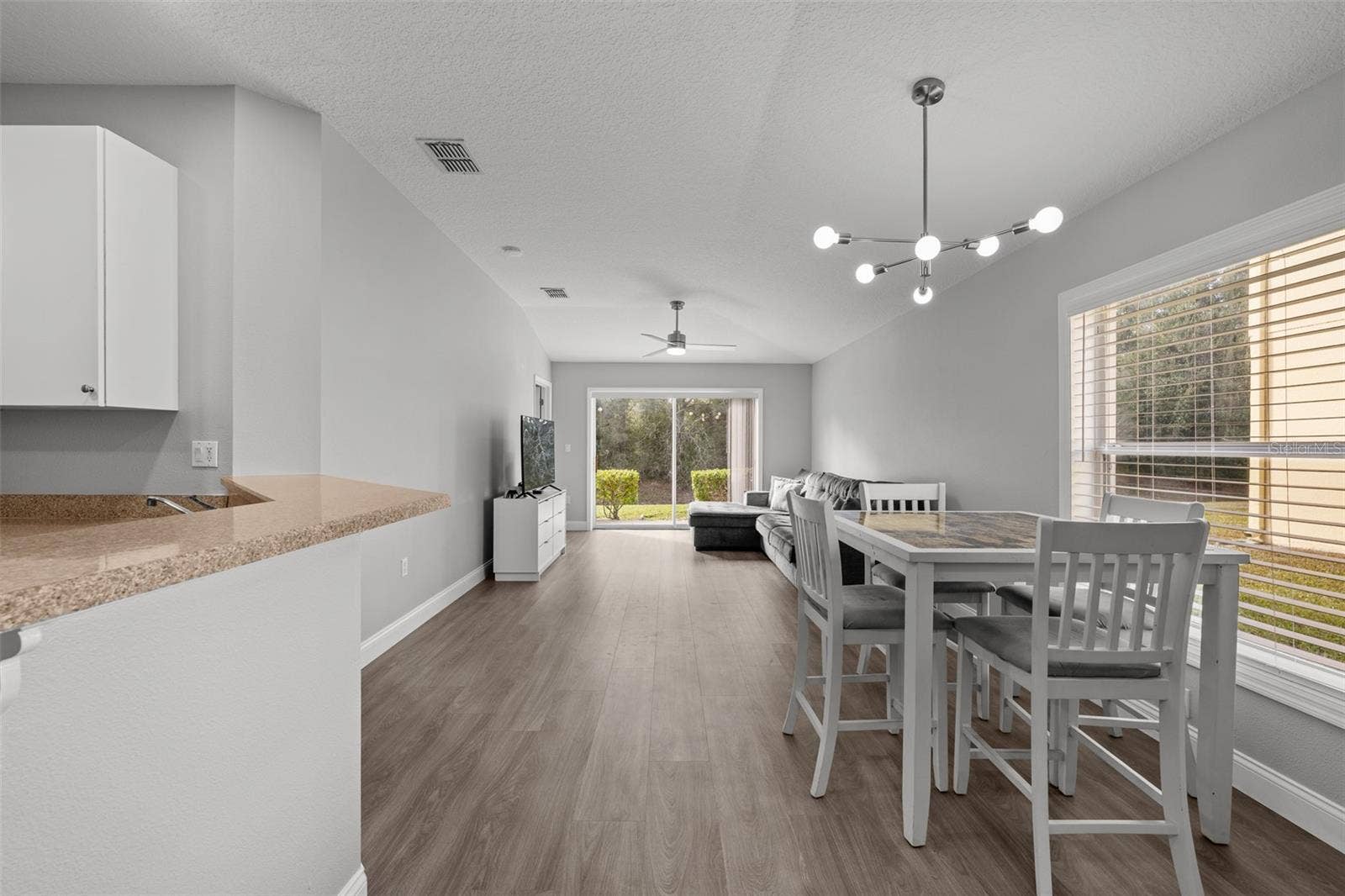 8516 CORINTHIAN WAY, New Port Richey, FL 34654 Open concept dining/living room