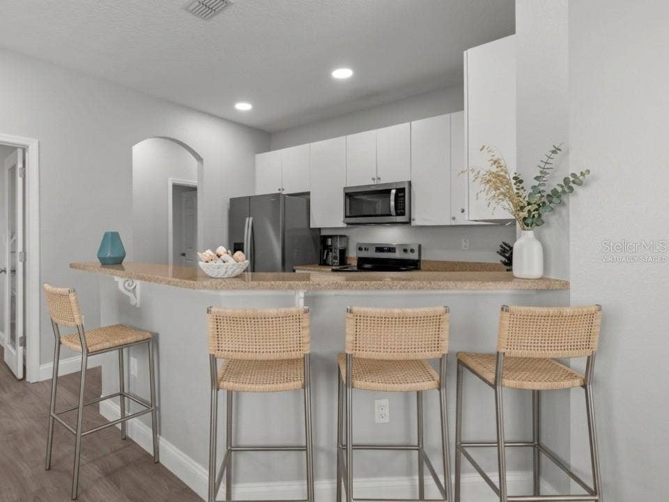 8516 CORINTHIAN WAY, New Port Richey, FL 34654 Breakfast bar (virtually staged)