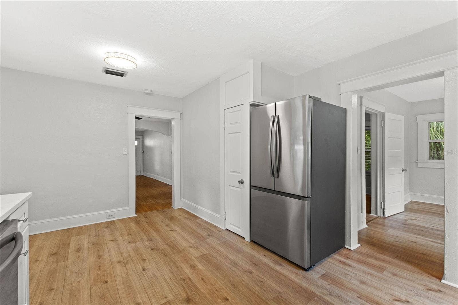 6303 N KING STREET, Tampa, FL 33604 Kitchen leading to laundry room and dining room