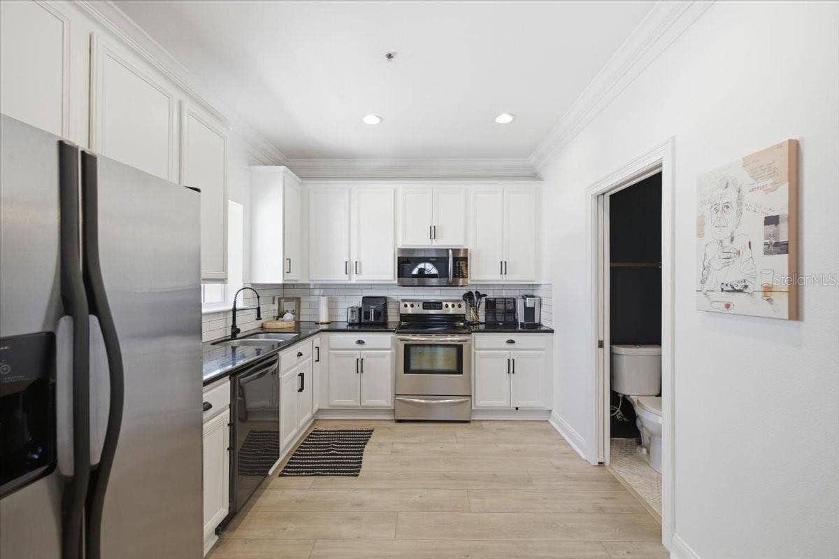 Kitchen! Only area in home not fully renovated.