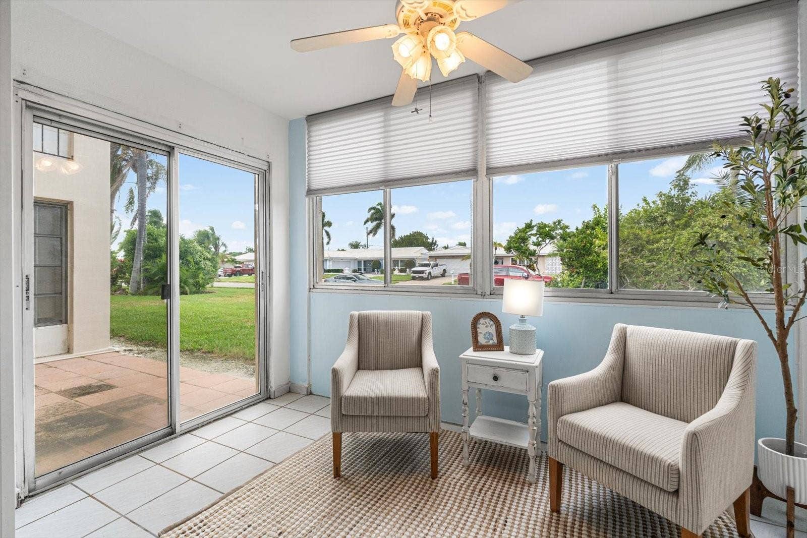 10351 REGAL DRIVE, #4, Largo, FL 33774 A light and bright Florida room, creates an attractive extra space.