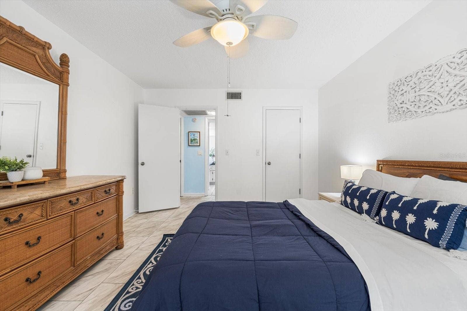 10351 REGAL DRIVE, #4, Largo, FL 33774 A large walk-in closet is offered and easy access to private primary bathroom.
