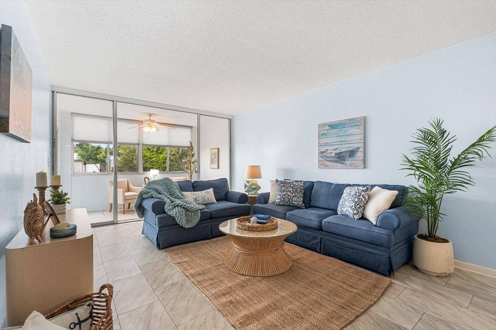 10351 REGAL DRIVE, #4, Largo, FL 33774 Natural light fills the living spaces of this condo, creating wide open spaces, perfect for living and entertaining.