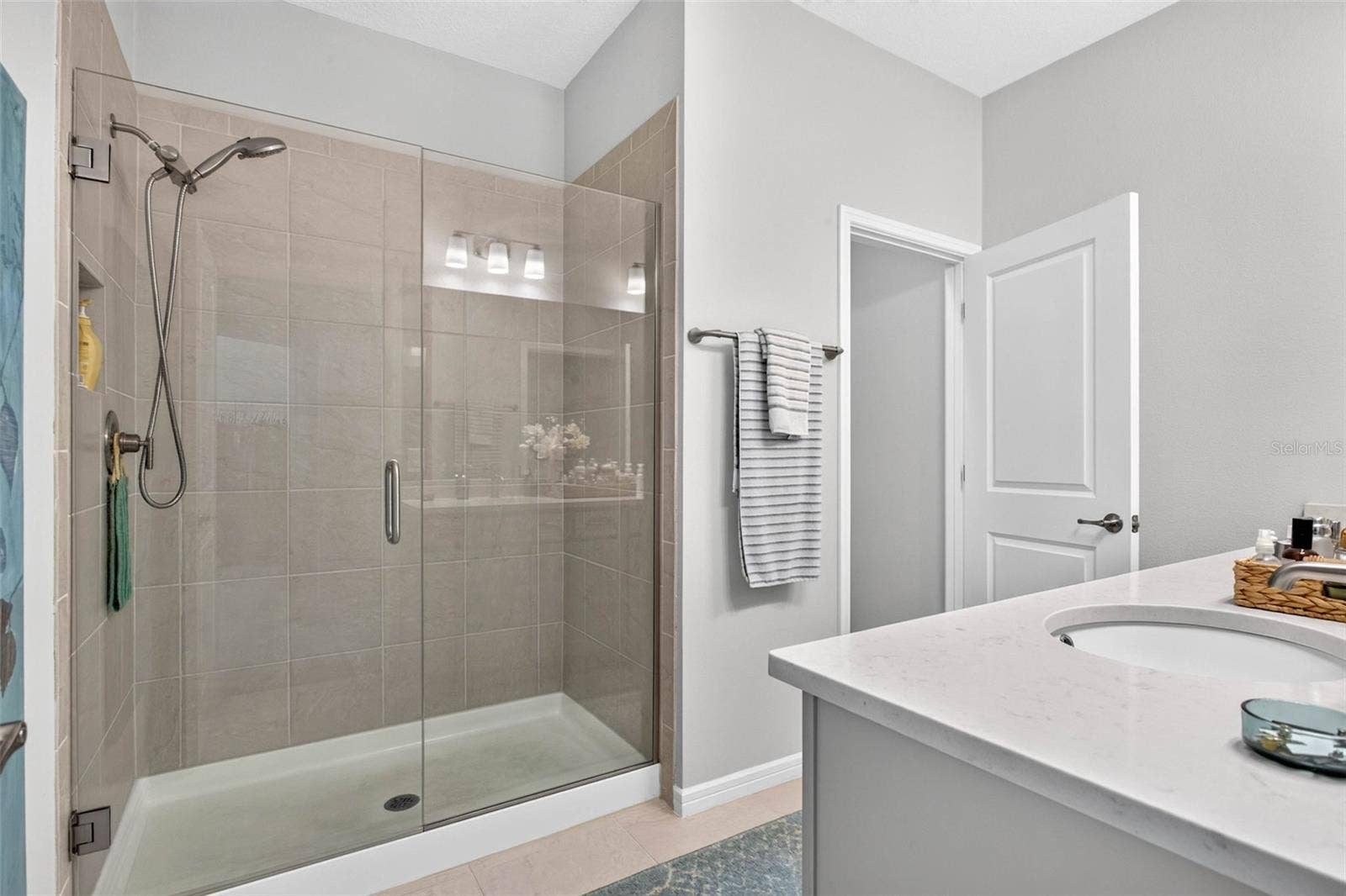 11211 BEACH WALK WAY NE, St Petersburg, FL 33716 Primary bathroom w Walk In Shower