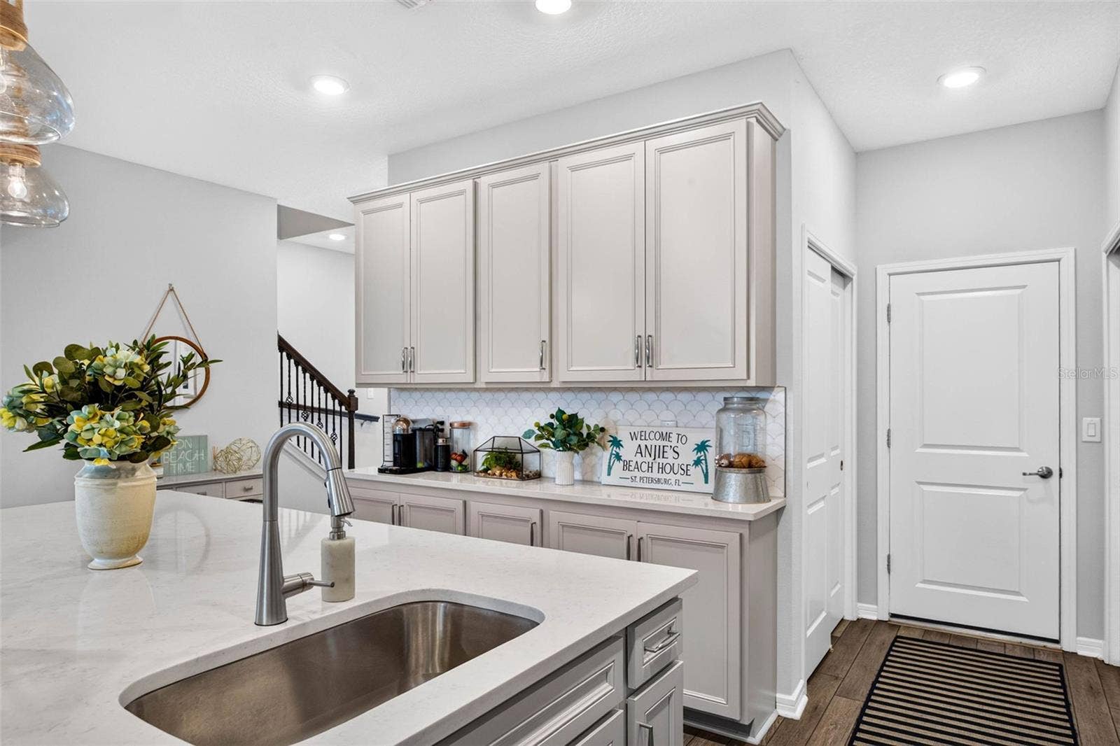 11211 BEACH WALK WAY NE, St Petersburg, FL 33716 Custom Cabinets and back Splash