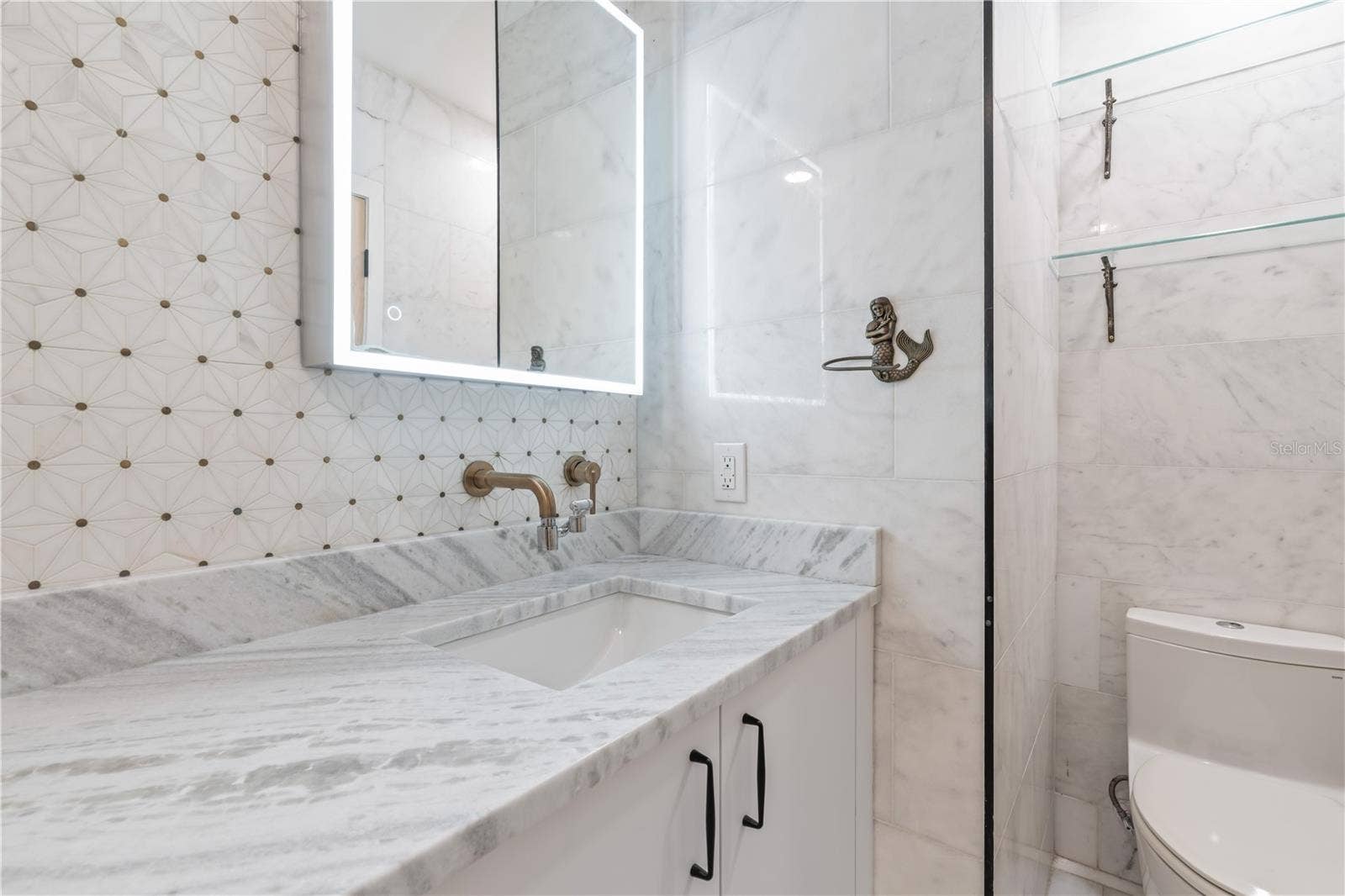 123 8TH STREET, Belleair Beach, FL 33786 hallway, guest bathroom