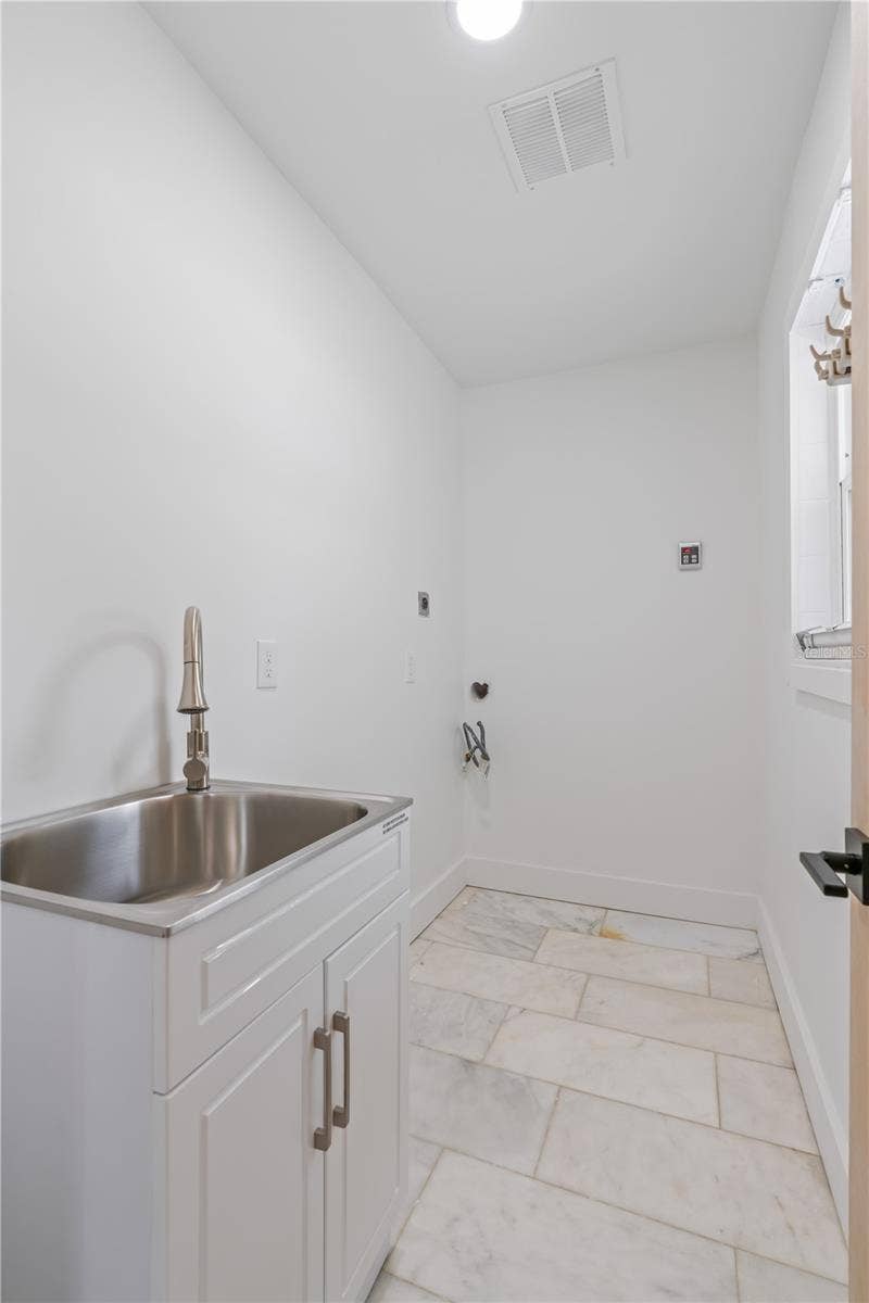 123 8TH STREET, Belleair Beach, FL 33786 laundry room