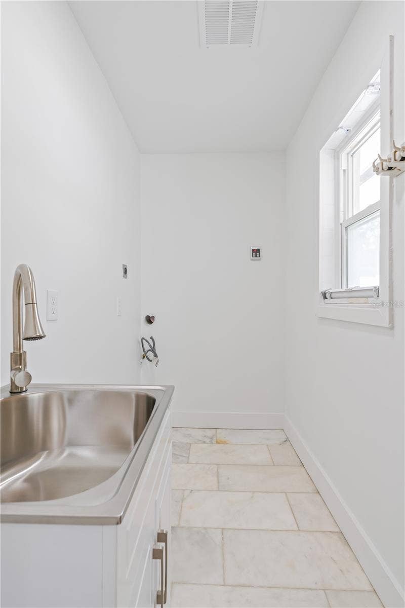 123 8TH STREET, Belleair Beach, FL 33786 laundry room
