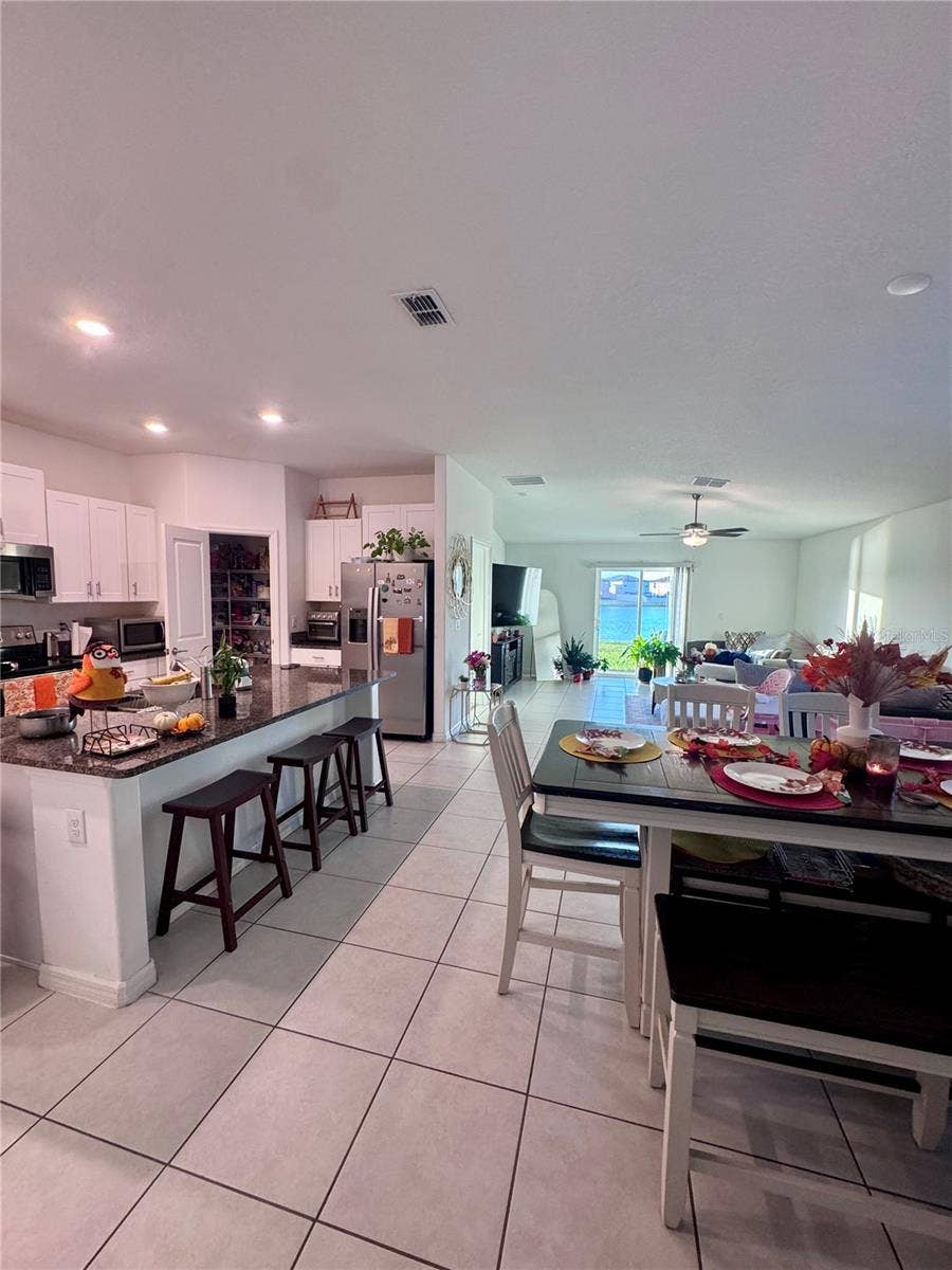 5535 BLUE AZURE DRIVE, Wimauma, FL 33598 kitchen/dining/living