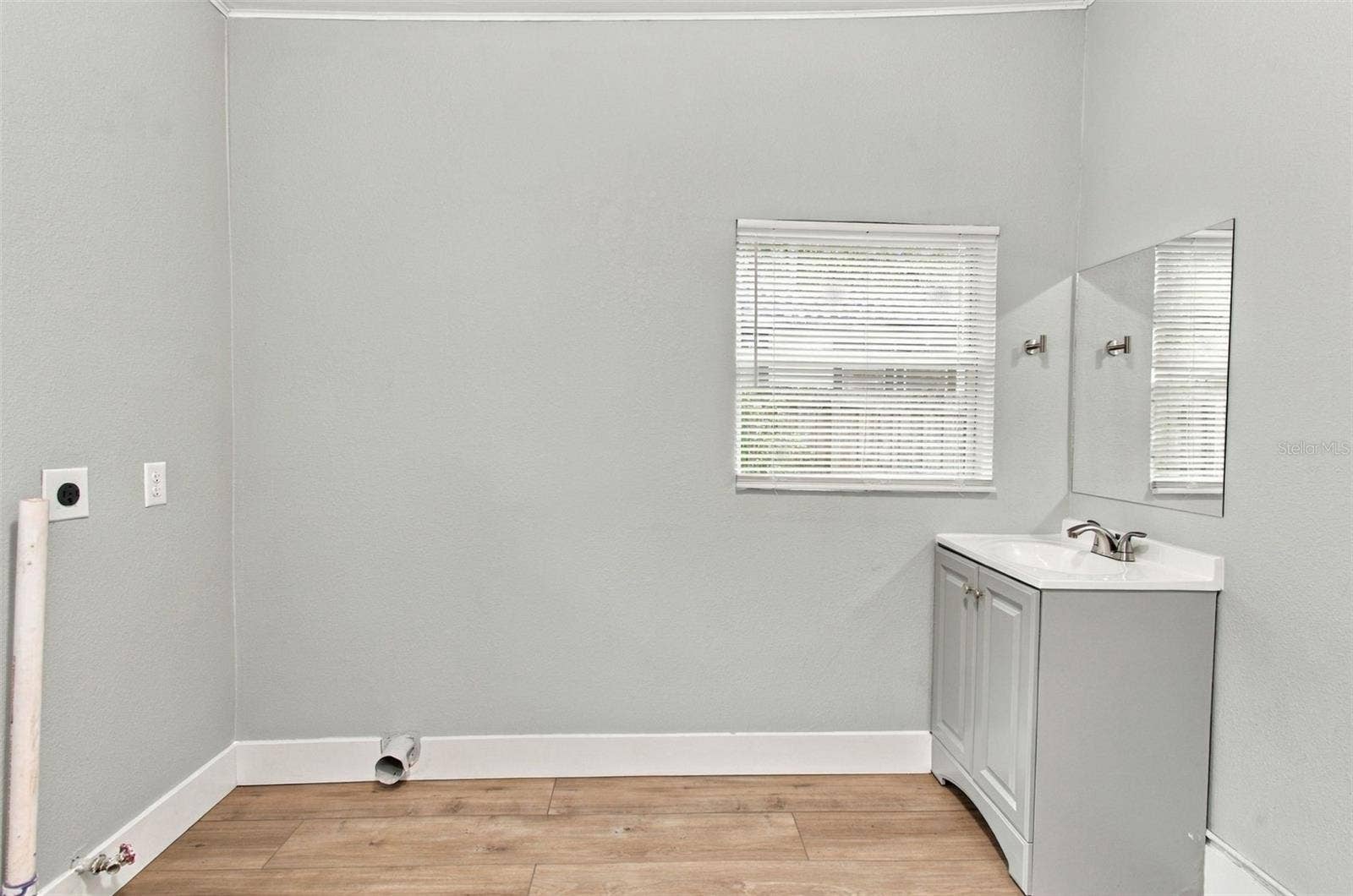 1225 E OSBORNE AVENUE, Tampa, FL 33603 Laundry Area & Half Bath