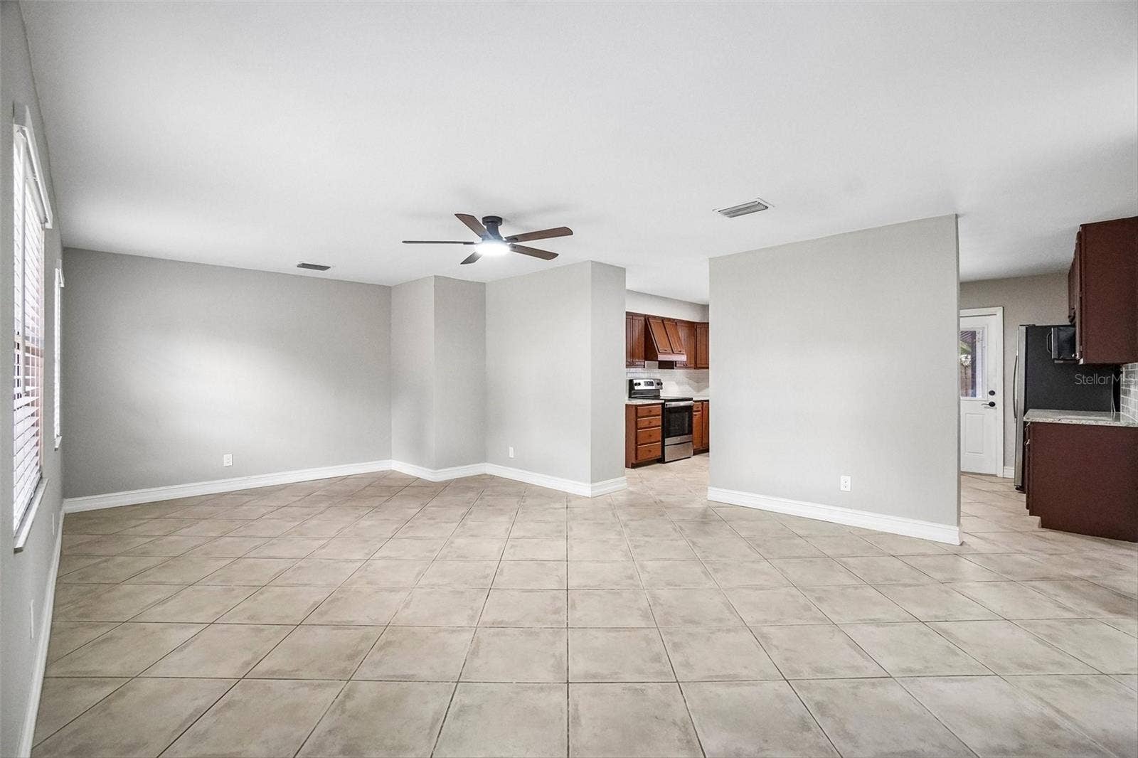 715 PAPAYA DRIVE, Tampa, FL 33619 Living Room View 2