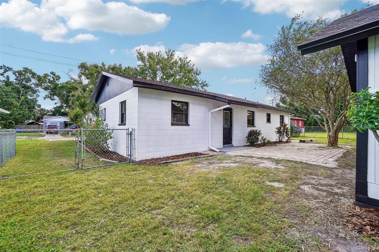 715 PAPAYA DRIVE, Tampa, FL 33619 Backyard View 1