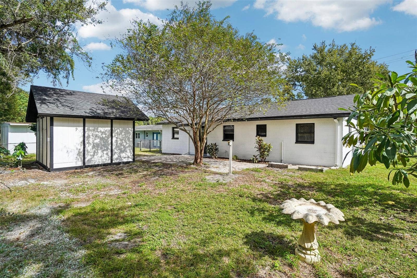 715 PAPAYA DRIVE, Tampa, FL 33619 Backyard View 2
