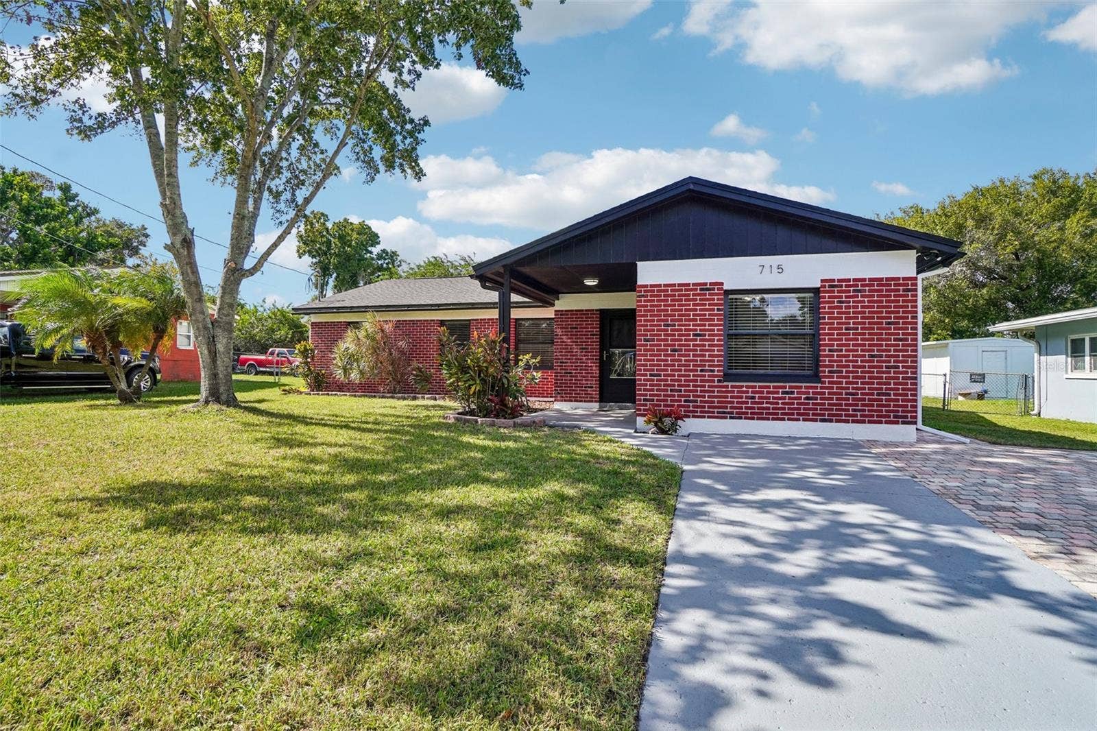 715 PAPAYA DRIVE, Tampa, FL 33619 Front driveway with pavers