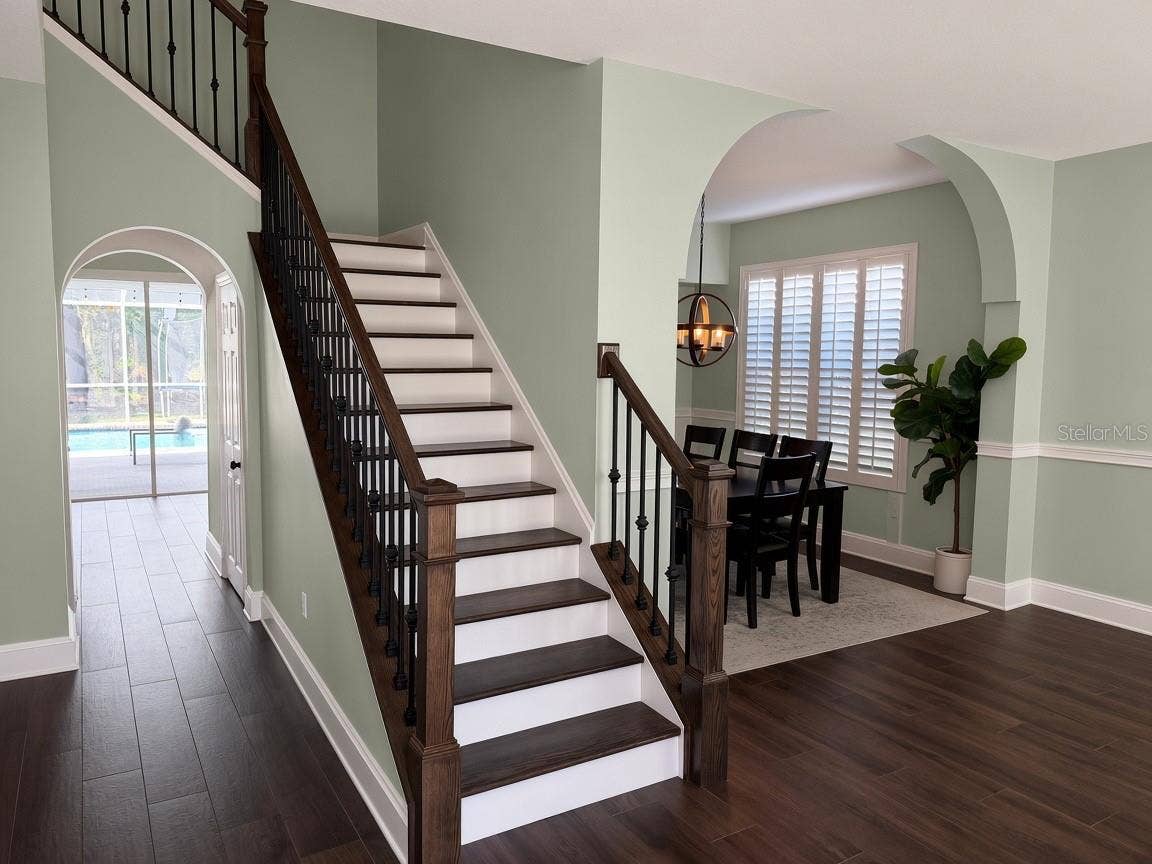 Stair case/dining room as you enter