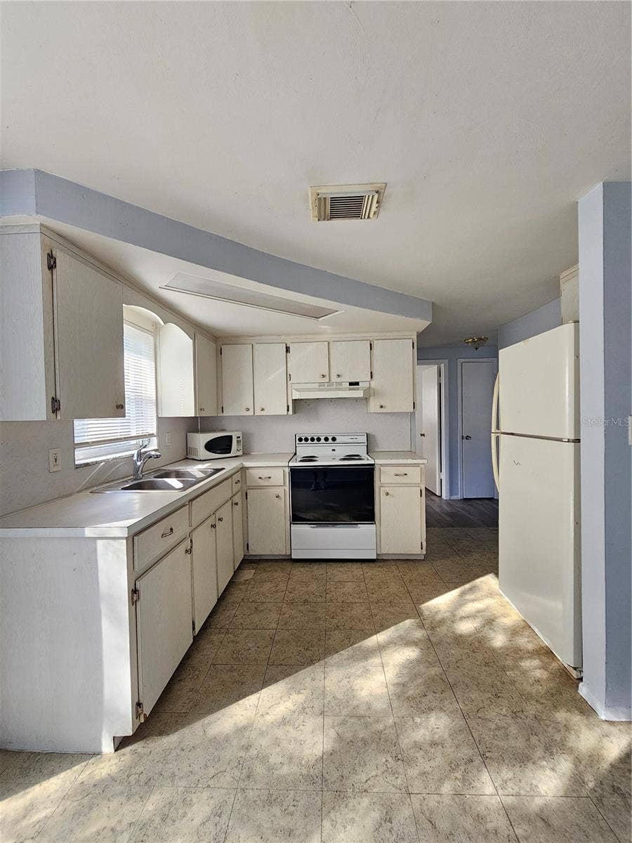 1031 CHELSEA LANE, Holiday, FL 34691