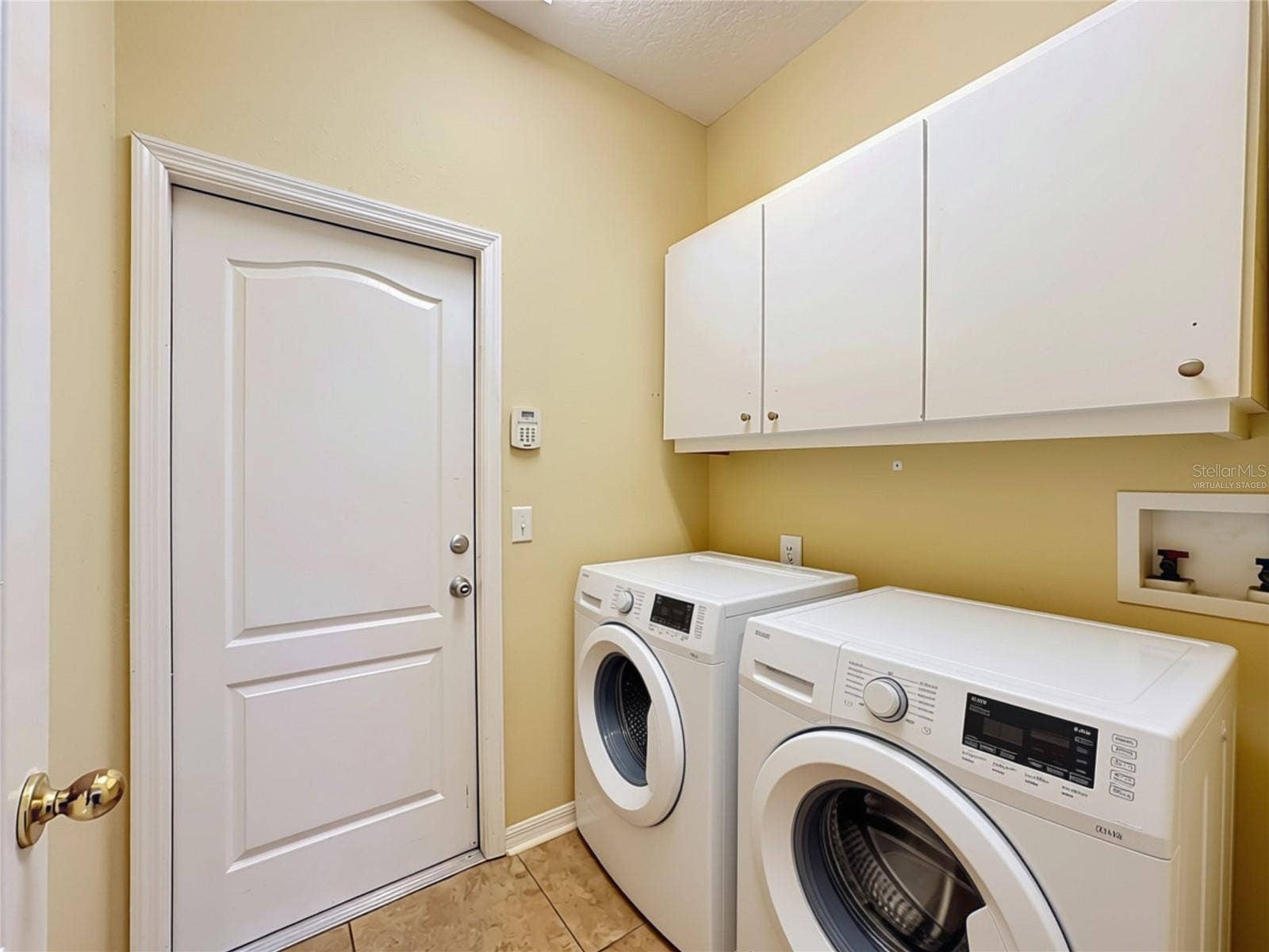Virtually Staged Laundry Room (washer/dryer)
