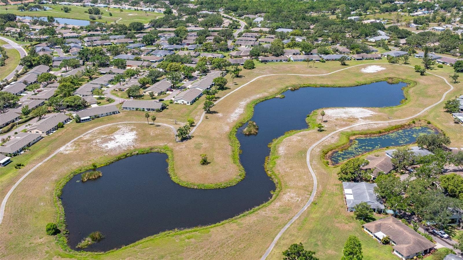 828 TREMONT GREENS LANE, #134, Sun City Center, FL 33573 Retired Golf Course - now Pedestrian Trails