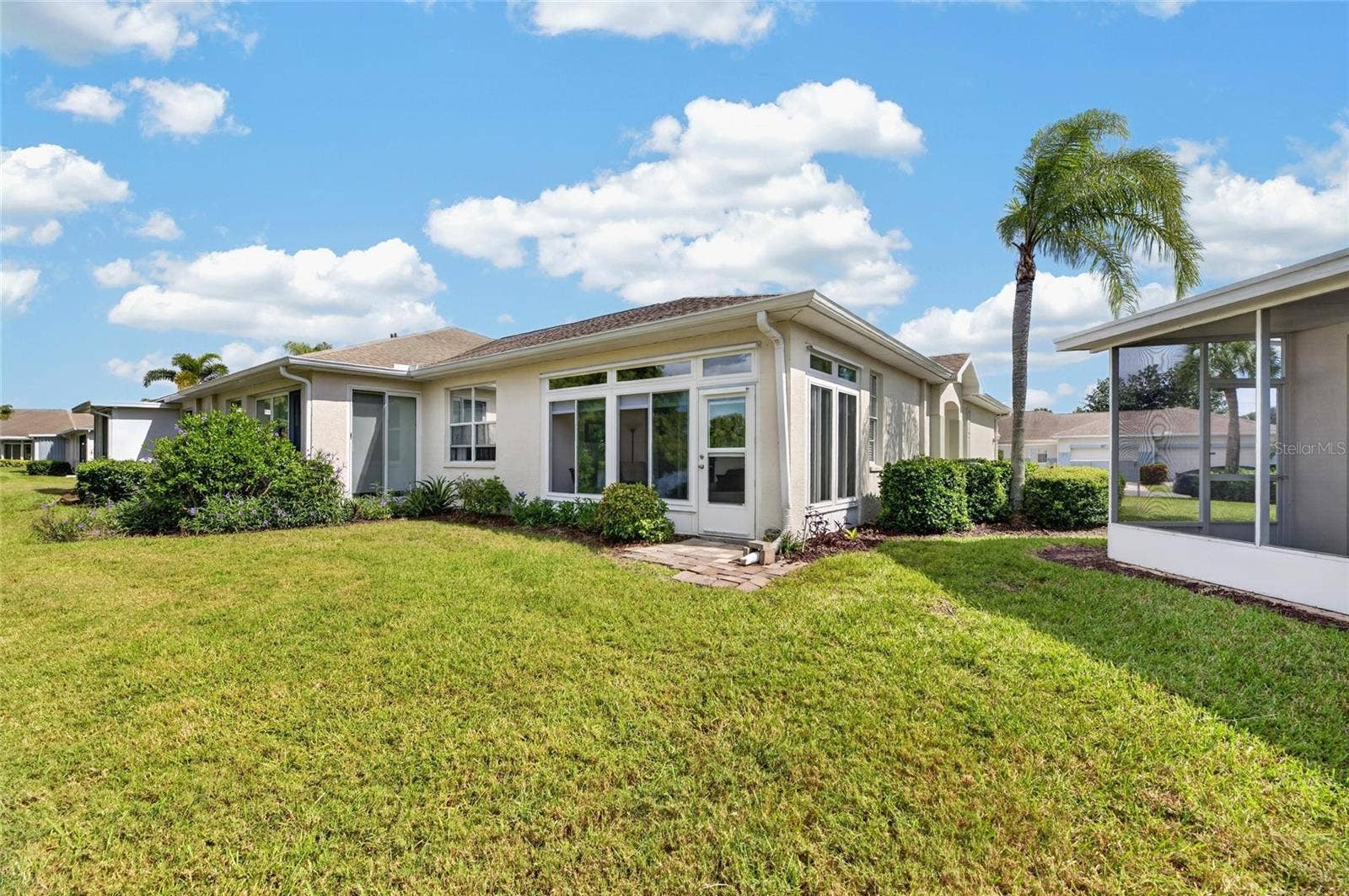 828 TREMONT GREENS LANE, #134, Sun City Center, FL 33573 Rear of the home