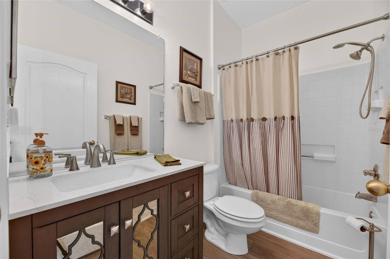 828 TREMONT GREENS LANE, #134, Sun City Center, FL 33573 Guest bathroom