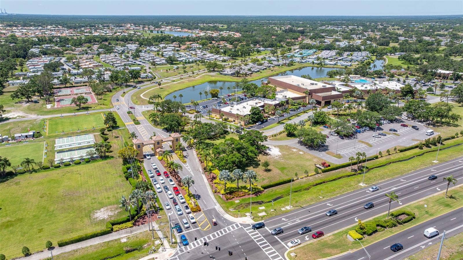 828 TREMONT GREENS LANE, #134, Sun City Center, FL 33573 Kings Point Main Entrance