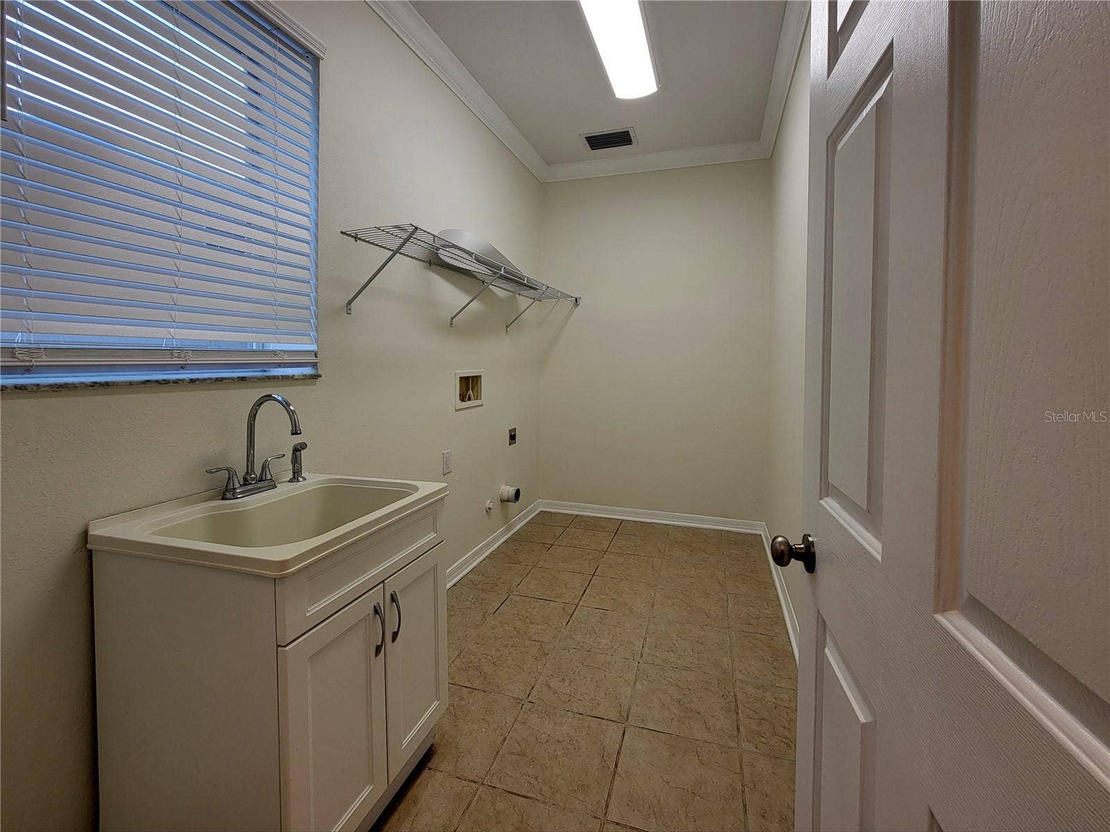 19023 NARIMORE DRIVE, Land O Lakes, FL 34638 Laundry room