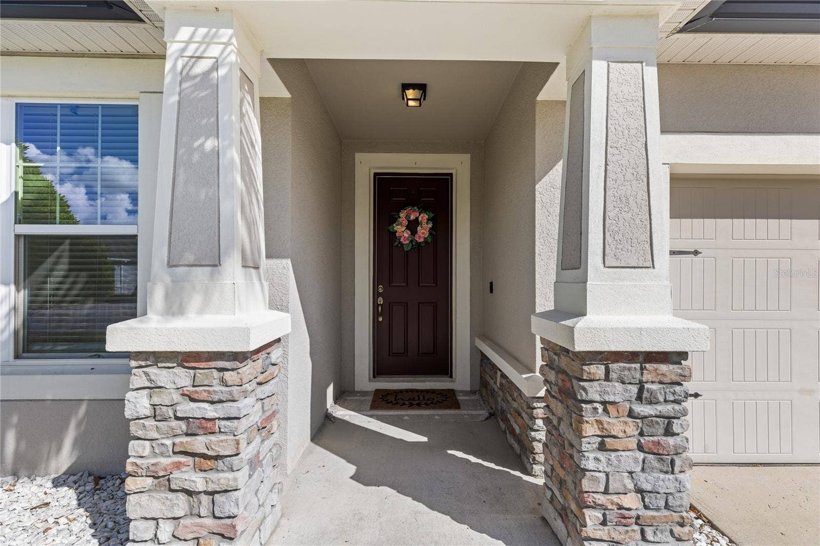 1007 LEE SHORE STREET, Valrico, FL 33594 Front door of home