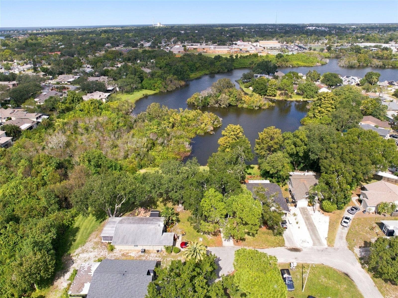 770 ARTHURS COURT, Tarpon Springs, FL 34689 Ariel View showing Tarpon Springs High School across the Lake